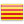 en català